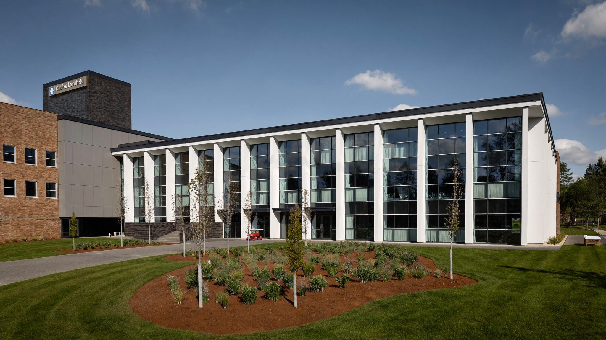 Exterior of a modern regional hospital, representing coordinated regional clinical care.
